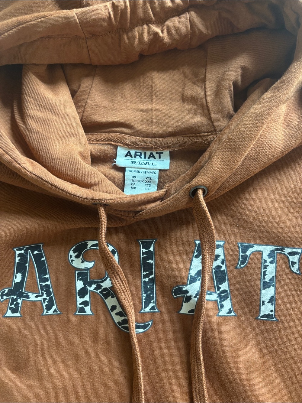 Ariat Texas Orange Cowprint Logo Pullover Hoodie - Picture 2 of 3